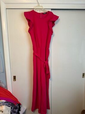 Sleeveless Hot Pink Jumpsuit with Ruffle Shoulders and Tie Waist